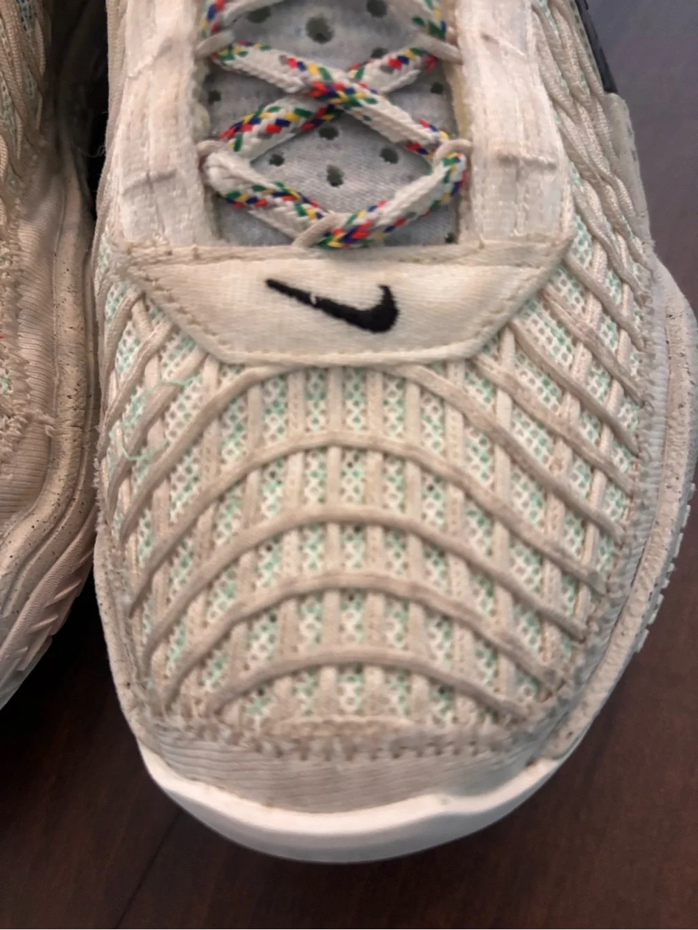 Nike Cosmic Unity Cream and Black Running Shoes